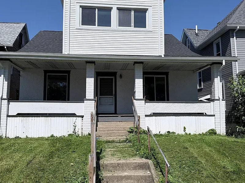 Front exterior of a renovated two-storey Yoak Properties rental home